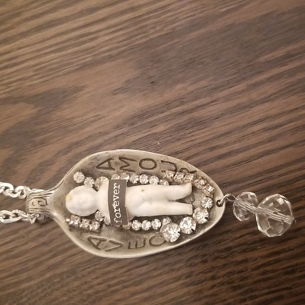 Frozen Charlotte necklace as found